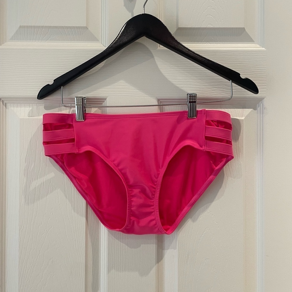 Woman’s hot pink bikini bottoms
